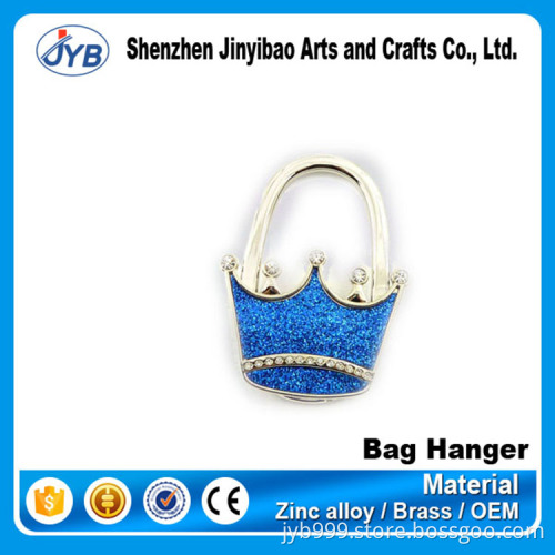 high quality strong fashion design round diamond bag hanger for women